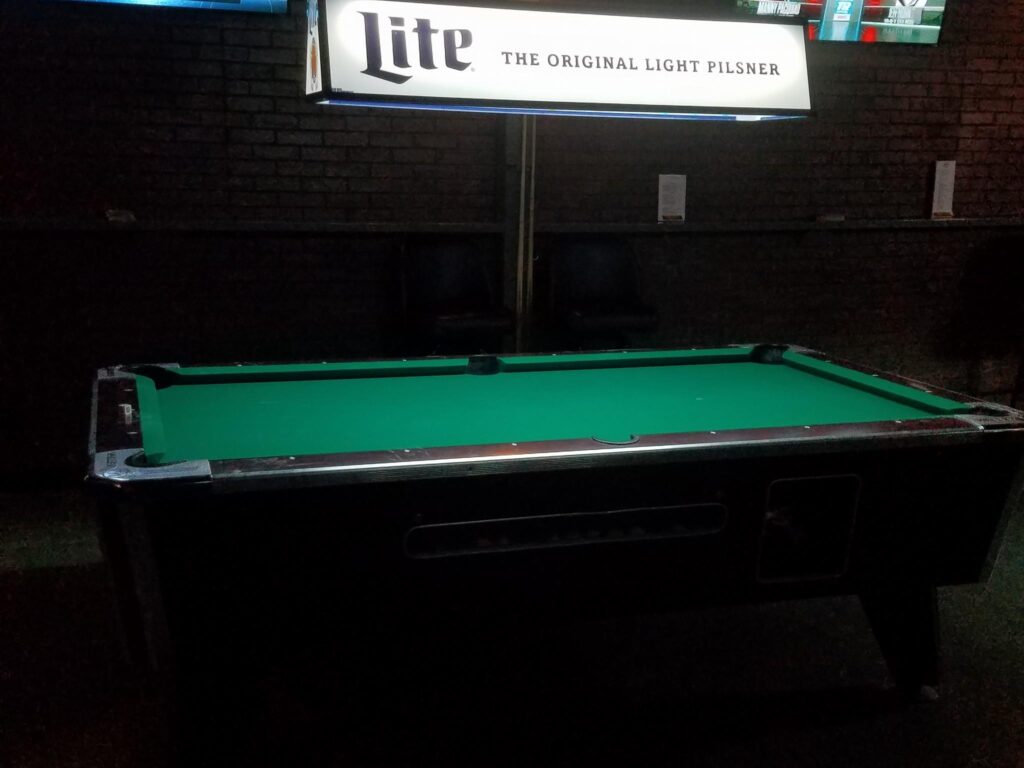 Pool Table At Burton's Thornton Park, A locals favorite Dive Bar in Orlando, Florida.